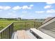 Balcony overlooking marsh with lounge chairs and water views at 1663 Harbor Dr., North Myrtle Beach, SC 29582