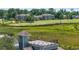 Tranquil rooftop deck overlooking a scenic golf course with lush green fairways and peaceful surroundings at 1663 Harbor Dr., North Myrtle Beach, SC 29582