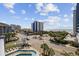 Beautiful aerial view of the resort, pool, and surrounding cityscape and ocean at 2000 S Ocean Blvd. # V405, Myrtle Beach, SC 29577