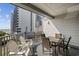 Spacious balcony with seating area and views of neighboring buildings at 2000 S Ocean Blvd. # V405, Myrtle Beach, SC 29577