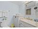 Bright bathroom featuring a sink, mirror, toilet, and towels at 2000 S Ocean Blvd. # V405, Myrtle Beach, SC 29577