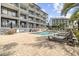Inviting pool area with lounge chairs, perfect for relaxation and enjoying the outdoors at 2000 S Ocean Blvd. # V405, Myrtle Beach, SC 29577