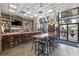Spacious restaurant with a bar, communal seating, and bright lighting at 2000 S Ocean Blvd. # V405, Myrtle Beach, SC 29577