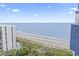 Stunning aerial view of the beach, ocean, and beachfront condos, offering a glimpse of coastal paradise at 2001 S Ocean Blvd. # 1408, Myrtle Beach, SC 29577