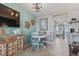 Dining area with seating for four, open to the kitchen and living area for easy entertaining at 2001 S Ocean Blvd. # 1408, Myrtle Beach, SC 29577