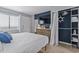 Charming bedroom featuring a dresser, closet, and a window for natural light, creating a cozy ambiance at 2001 S Ocean Blvd. # 1408, Myrtle Beach, SC 29577