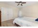 Neutral-toned bedroom features a ceiling fan, plush carpet, and double door closet at 2010 Chattooga Ct., Myrtle Beach, SC 29588