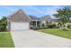Charming single Gathering home with brick and vinyl siding, two car garage and ample parking space at 2010 Chattooga Ct., Myrtle Beach, SC 29588