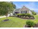 Charming single Gathering home with brick and vinyl siding, manicured lawn and garden at 2010 Chattooga Ct., Myrtle Beach, SC 29588