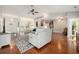 Spacious living room with hardwood flooring, ceiling fan and an open layout at 2010 Chattooga Ct., Myrtle Beach, SC 29588