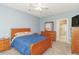 Primary bedroom featuring an ensuite bathroom and ample closet space at 2060 Cross Gate Blvd. # 102, Surfside Beach, SC 29575