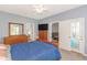 Bedroom featuring an ensuite bathroom, a view and closet space at 2060 Cross Gate Blvd. # 102, Surfside Beach, SC 29575