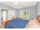 Bedroom with a view from the window and closet space at 2060 Cross Gate Blvd. # 102, Surfside Beach, SC 29575