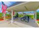 Covered picnic pavilion in the community area with picnic tables, BBQ and picturesque views at 2060 Cross Gate Blvd. # 102, Surfside Beach, SC 29575
