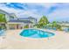 Community pool surrounded by lounge chairs and lush landscaping at 2060 Cross Gate Blvd. # 102, Surfside Beach, SC 29575