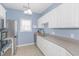 Well-lit kitchen featuring white cabinetry, modern appliances, and ample counter space at 2060 Cross Gate Blvd. # 102, Surfside Beach, SC 29575