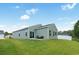 Spacious backyard with a patio and a well-maintained lawn perfect for outdoor enjoyment at 228 Averyville Dr., Conway, SC 29526