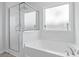 Modern bathroom with separate glass shower and soaking tub at 228 Averyville Dr., Conway, SC 29526