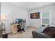 Cozy bedroom designed as an office with a desk, comfortable seating, and natural light from the window at 228 Averyville Dr., Conway, SC 29526