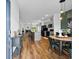 Open-concept kitchen and dining area boasting stainless appliances and bar stool seating at the kitchen island at 228 Averyville Dr., Conway, SC 29526