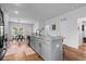 Bright kitchen showcases an island, granite countertops, stainless steel appliances, and a cozy dining area at 228 Averyville Dr., Conway, SC 29526
