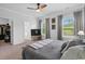 Spacious main bedroom with ensuite bathroom featuring neutral tones and natural light at 228 Averyville Dr., Conway, SC 29526