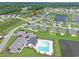 Aerial view of the community showcasing the homes, ponds, community pool and a parking area at 232 Angel Wing Dr., Myrtle Beach, SC 29588