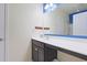 Bathroom with white sink, dark brown cabinets and blue accent at 232 Angel Wing Dr., Myrtle Beach, SC 29588