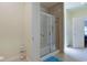 Bathroom featuring a shower with a glass door and tiled walls, white door at 232 Angel Wing Dr., Myrtle Beach, SC 29588