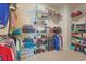Walk-in closet with shelves, providing ample storage space for clothes, shoes, and accessories at 232 Angel Wing Dr., Myrtle Beach, SC 29588