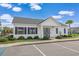 Exterior view of the well-maintained clubhouse with ample parking and manicured landscaping at 232 Angel Wing Dr., Myrtle Beach, SC 29588