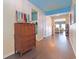 Inviting hallway with hardwood floors and decoratively painted blue ceilings at 232 Angel Wing Dr., Myrtle Beach, SC 29588