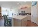 Modern kitchen featuring a large island with bar seating and pendant lights at 232 Angel Wing Dr., Myrtle Beach, SC 29588