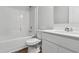 Bathroom featuring a shower-tub combo, neutral toilet and vanity at 24 Cape Point Dr., Conway, SC 29527