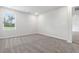 Bedroom with neutral carpet and a window showcasing an outdoor view at 24 Cape Point Dr., Conway, SC 29527