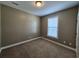 Cozy bedroom features carpet and a window for natural light at 244 Colby Ct., Myrtle Beach, SC 29588