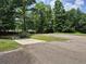 Scenic boat landing with concrete ramp and lush green surroundings, perfect for water access at 244 Colby Ct., Myrtle Beach, SC 29588