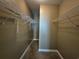 Walk-in closet with shelving for storage and organization at 244 Colby Ct., Myrtle Beach, SC 29588
