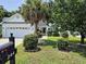 Charming single-story home featuring a well-maintained lawn, white exterior, and attached garage at 244 Colby Ct., Myrtle Beach, SC 29588