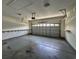 Spacious two-car garage with ample lighting and overhead door, ready for vehicles and storage at 244 Colby Ct., Myrtle Beach, SC 29588