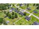 An aerial view shows the property's placement within a serene neighborhood with manicured lawns and mature trees at 250 Penn Circle, Galivants Ferry, SC 29544
