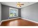 Bedroom with a ceiling fan and an exterior view at 250 Penn Circle, Galivants Ferry, SC 29544