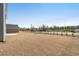 Large backyard showcasing potential for landscaping and outdoor activities, backing to wooded area at 28 Cape Point Dr., Conway, SC 29527