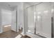 Bathroom features a shower with glass doors and tile floor at 28 Cape Point Dr., Conway, SC 29527