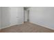 Bedroom with neutral carpet, white walls, and an open closet at 28 Cape Point Dr., Conway, SC 29527