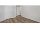 Laminate floored bedroom featuring a neutral color palette and access to other rooms at 28 Cape Point Dr., Conway, SC 29527
