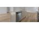 Kitchen island has granite countertops, stainless dishwasher, and sink with modern faucet at 28 Cape Point Dr., Conway, SC 29527