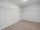 Walk-in closet with carpet and metal shelving at 28 Cape Point Dr., Conway, SC 29527