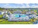 A beautiful community pool with sun loungers, seating areas, and manicured landscaping, ideal for relaxation and recreation at 2882 Ophelia Way, Myrtle Beach, SC 29577