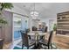 Dining area featuring a glass table set, sliding door access and a view into the living room at 2882 Ophelia Way, Myrtle Beach, SC 29577